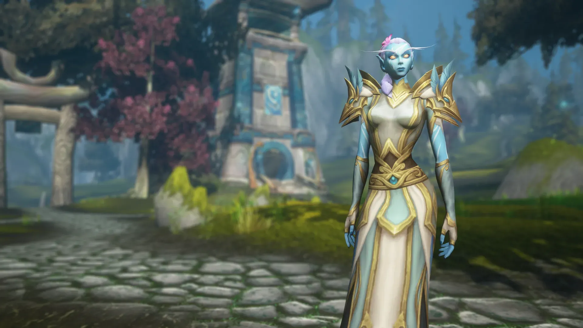 A Skyborne character in robes outside a shrine in World of Warcraft: Forever