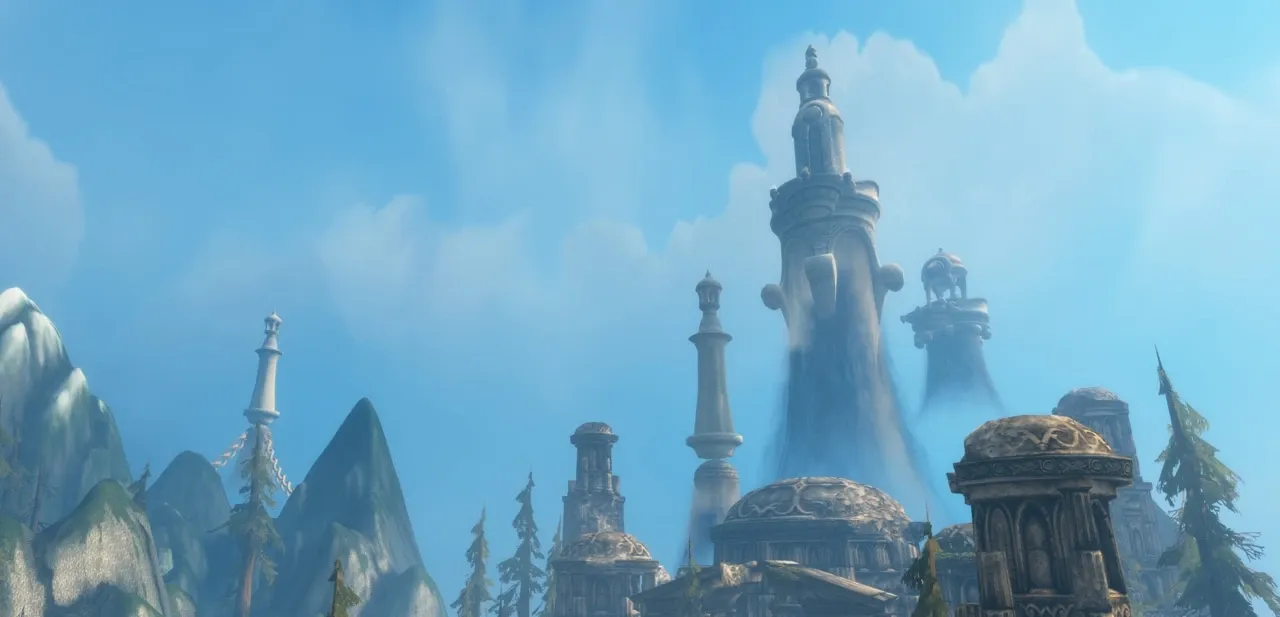 Türme von Zephras Isle, die sich über hellen Berggipfeln durch die Wolken erheben